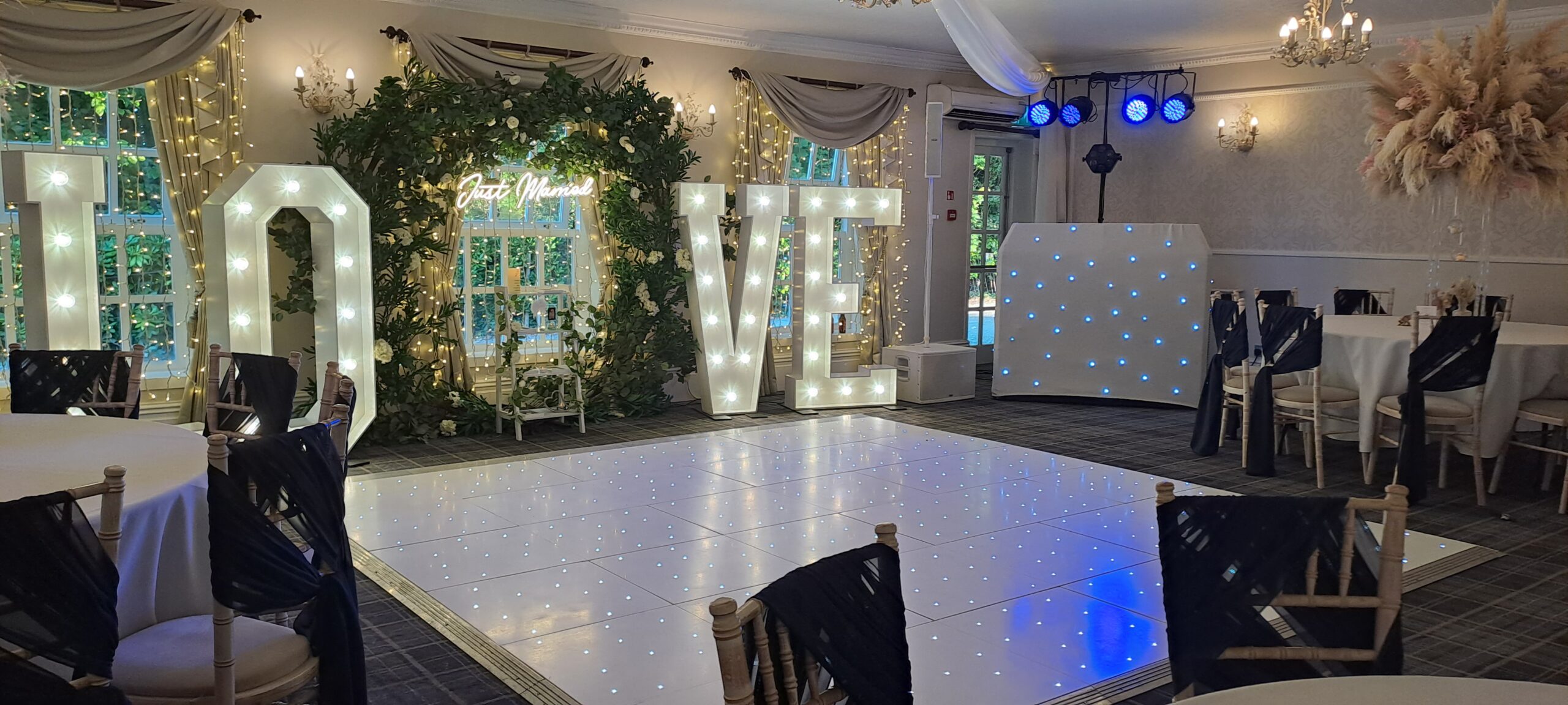 Singleton Lodge white wedding set up wth floor + LOVE